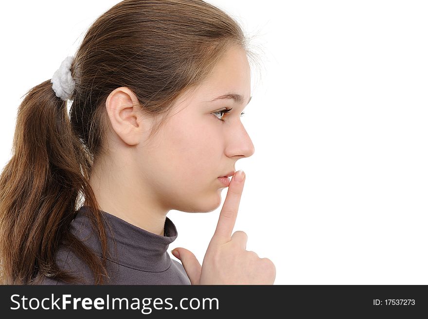 Young Woman With Finger On Lips