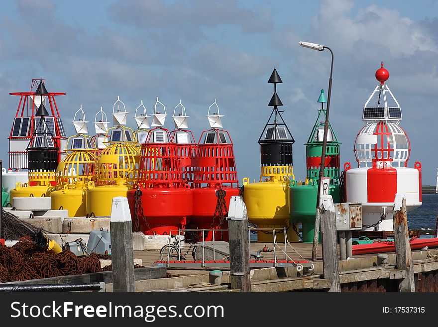 Multicolored buoys in the harbour