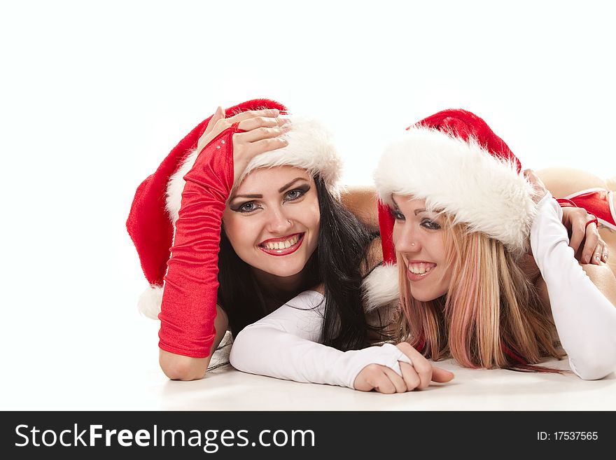 Playful girls in christmas hats