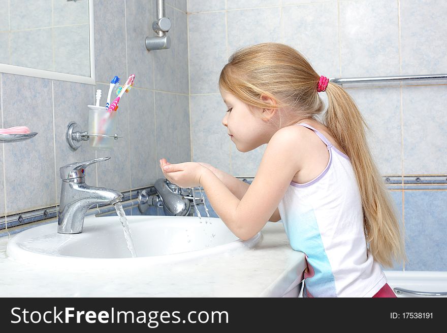Girl Washing In Bathroom