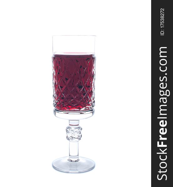 Red wine in wineglass isolated on white background. Red wine in wineglass isolated on white background