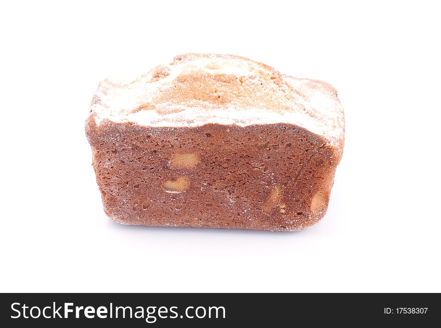 A single fruitcake isolated on white