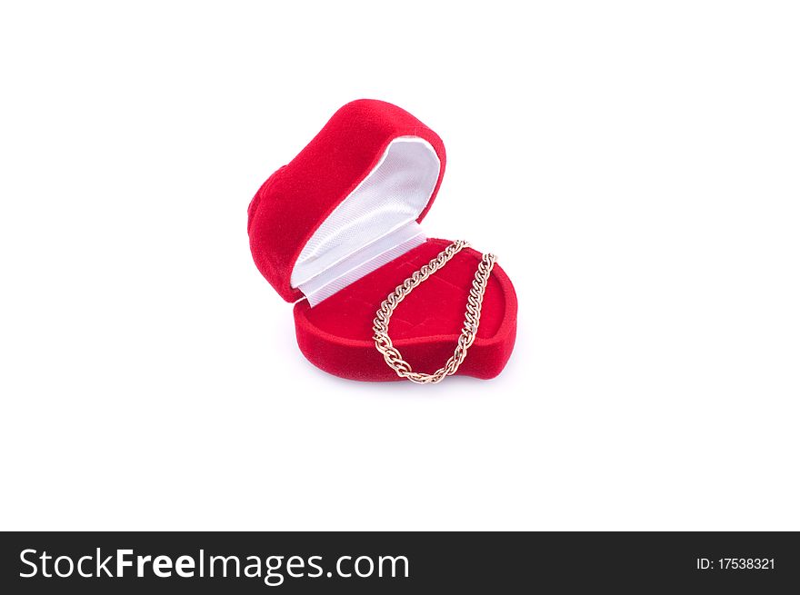 Gold bracelet and red gift packing , isolated white background.