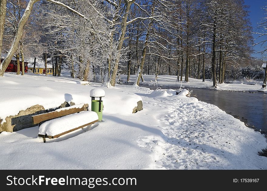 Winter Swedish river landscape in city park. Winter Swedish river landscape in city park