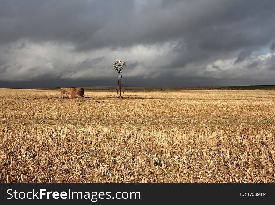 Wind pump in a field. Wind pump in a field