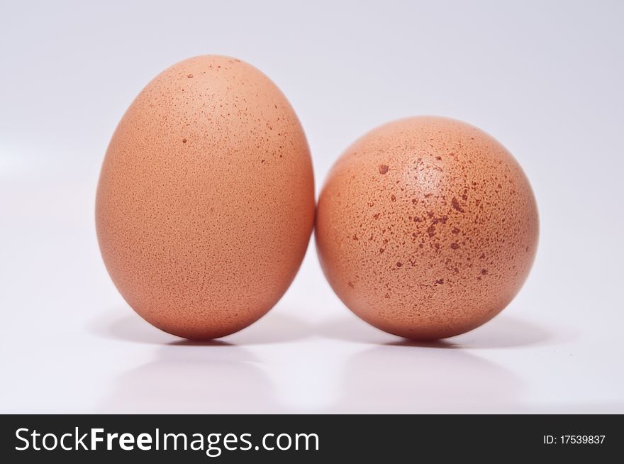 Two eggs isolated on a white background