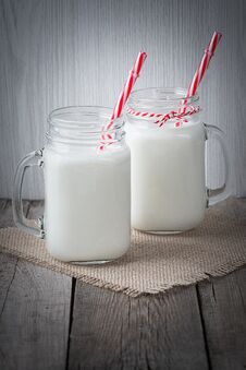 Glass Cups With Milk On A Wooden Rustic Background Royalty Free Stock Photography