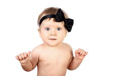 Surprise Child With Bow Stock Photography