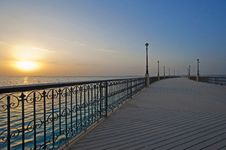 Sunrise Over The Ocean At A Pier Royalty Free Stock Image Sunrise Over The Ocean At A Pier Royalty Free Stock Image