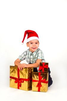 Boy In Santa Hat With A Bunch Of Gifts Royalty Free Stock Photo Boy In Santa Hat With A Bunch Of Gifts Royalty Free Stock Photo