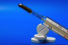 Pills And Thermometer Royalty Free Stock Image Pills And Thermometer Royalty Free Stock Image
