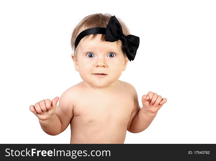 Surprise child with bow on white background