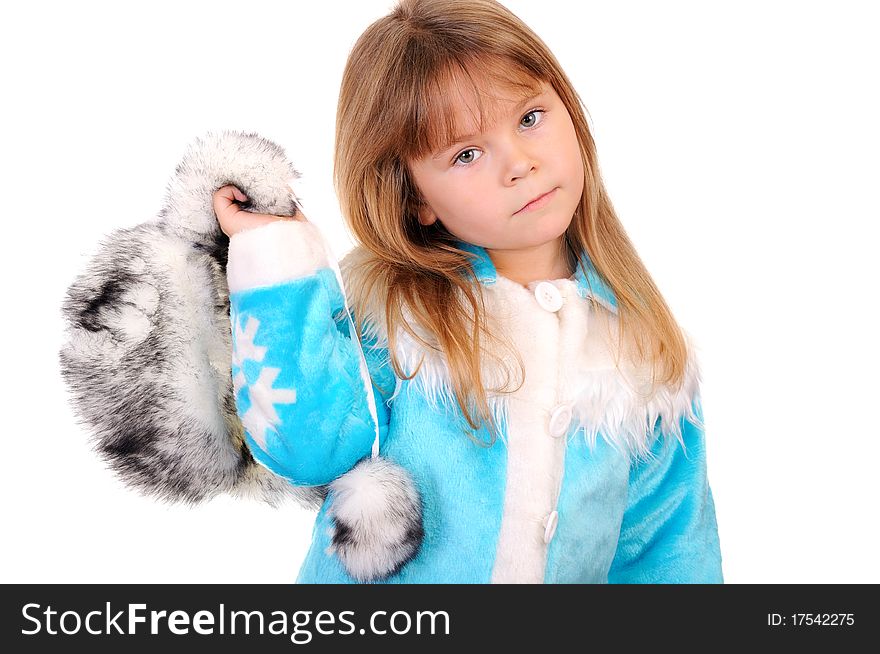The girl holds in a hand a winter fur cap on a white background