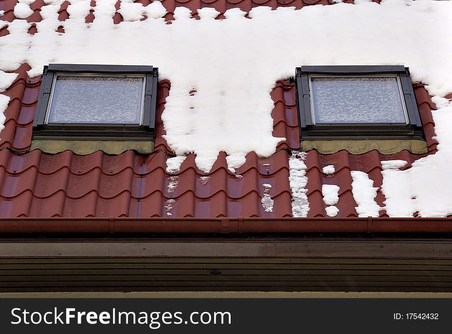 The photography of the top of single-family home covered by snow. Taken on 2010. The photography of the top of single-family home covered by snow. Taken on 2010.