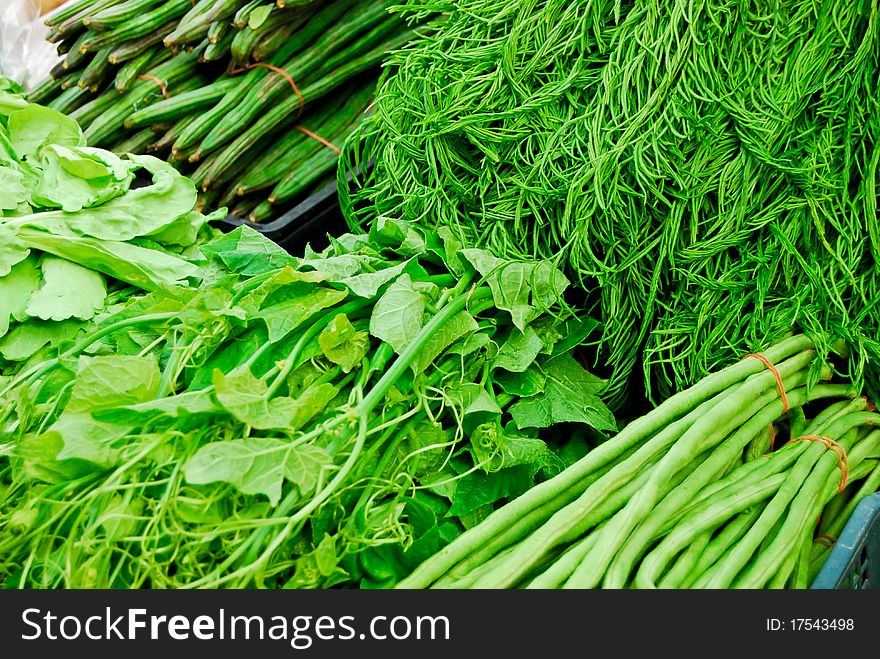 Variety of fresh vegetables in market closeup background , Asia , Thailand