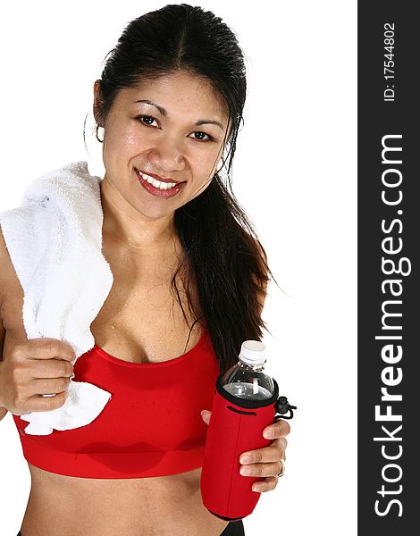Beautiful 30 year old Filipino woman in workout clothes, towel and water bottle sweating over white background. Beautiful 30 year old Filipino woman in workout clothes, towel and water bottle sweating over white background.
