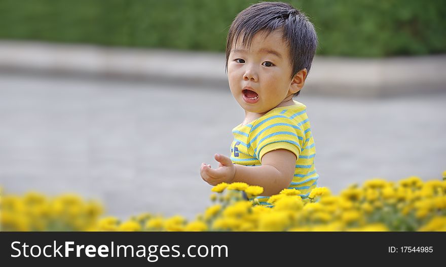 A cute kid playing in a park. A cute kid playing in a park