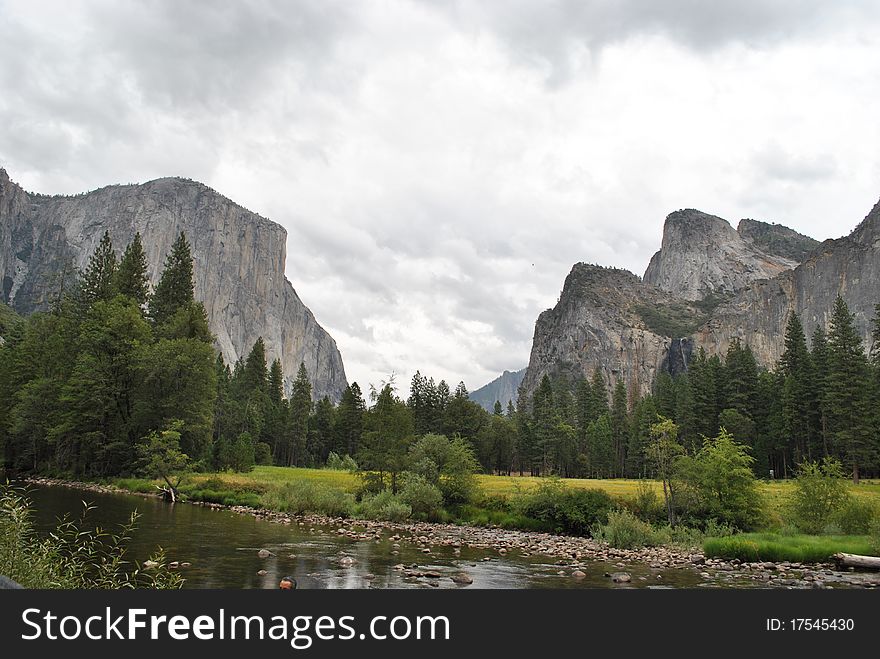 A rare cloudy day in Yosemite makes for a unique view of El Capitan on the left and Bridal Veil Falls on the right. A rare cloudy day in Yosemite makes for a unique view of El Capitan on the left and Bridal Veil Falls on the right.