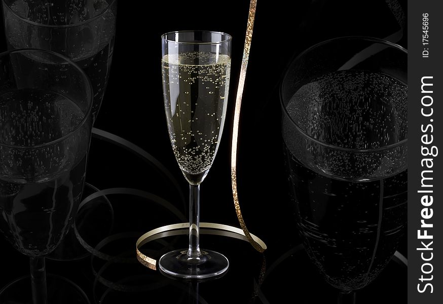 Glass of champagne and paper streamer