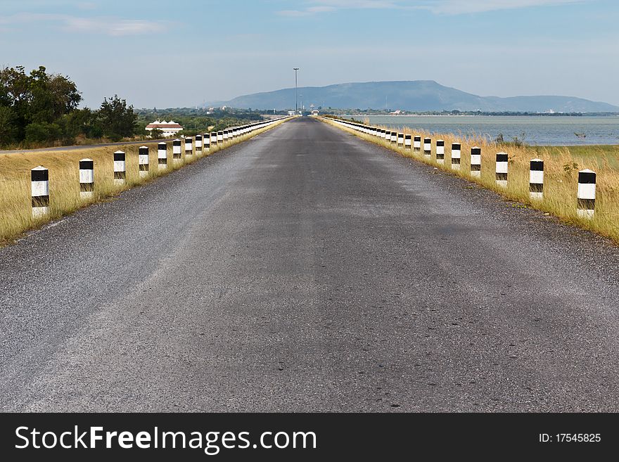 Road asphalt to mountain island. Road asphalt to mountain island