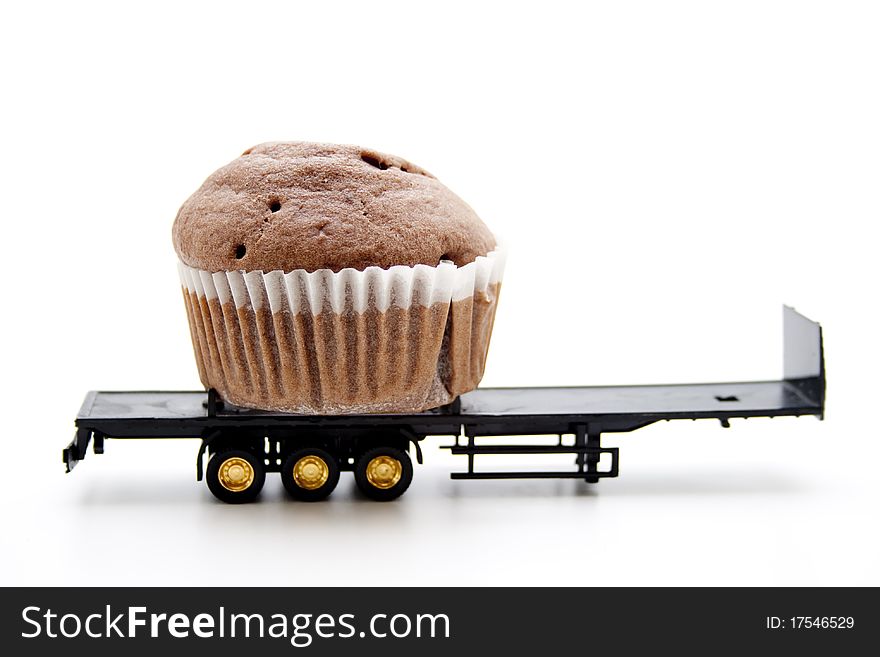 Muffin baked with chocolate onto means of transportation