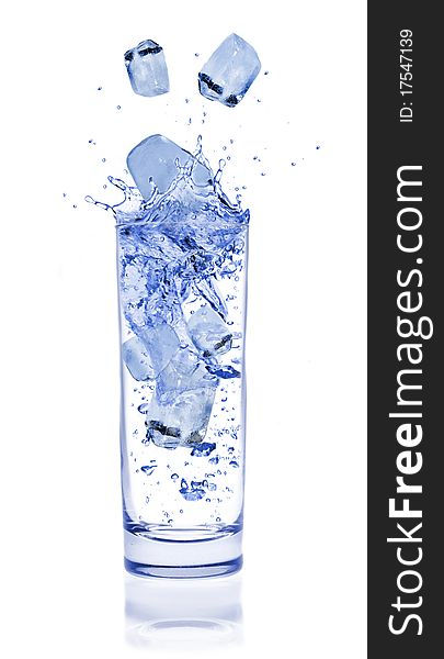 Ice cubes throwing into glass, isolated on white background. Ice cubes throwing into glass, isolated on white background