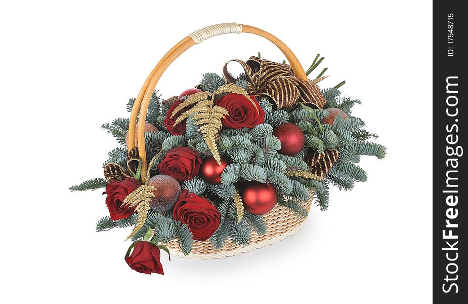 Christmas basket with flowers on white background