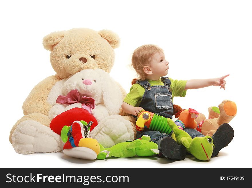 Beautiful little boy with toys isolated on white. Beautiful little boy with toys isolated on white