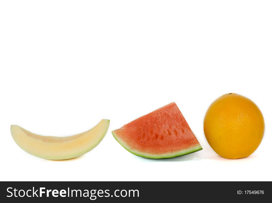Cantaloupe, watermelon and orange isolated on white background. Cantaloupe, watermelon and orange isolated on white background.