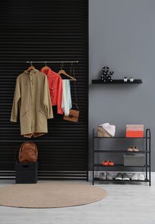 Hallway Interior With Stylish Furniture, Clothes And Accessories Stock Image