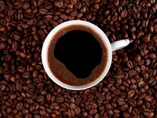 Cup Of Coffee Isolated On Roasted Coffee Beans Stock Photos Cup Of Coffee Isolated On Roasted Coffee Beans Stock Photos