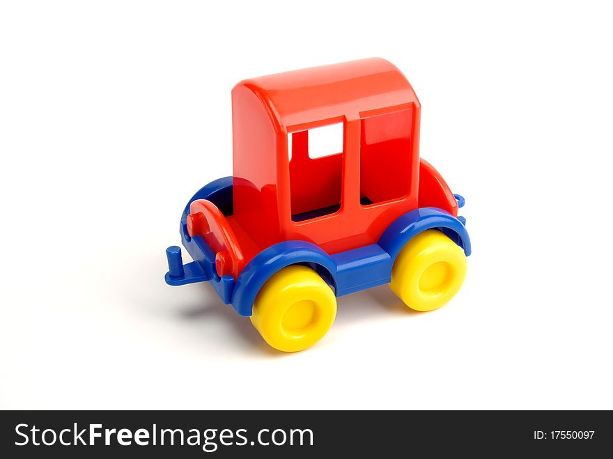 A children's small toy on white background. A children's small toy on white background