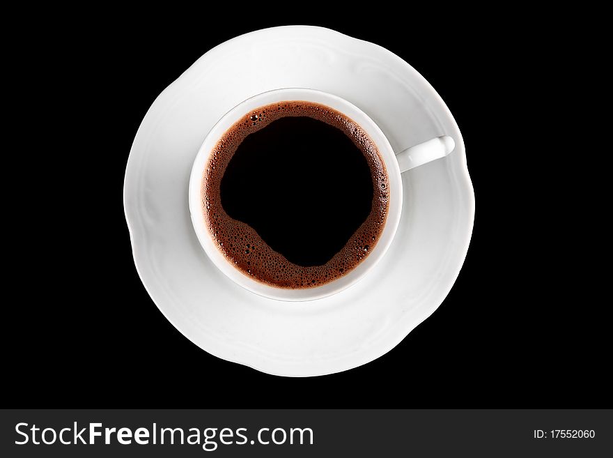 Cup of coffee, isolated on black surface