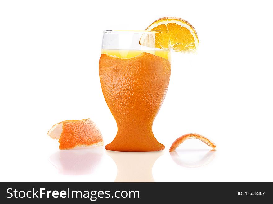 Freshly peel orange juice with orange peel pieces