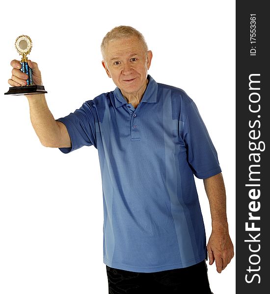 A senior man in happily displaying a small generic trophy.  Isolated on white. A senior man in happily displaying a small generic trophy.  Isolated on white.