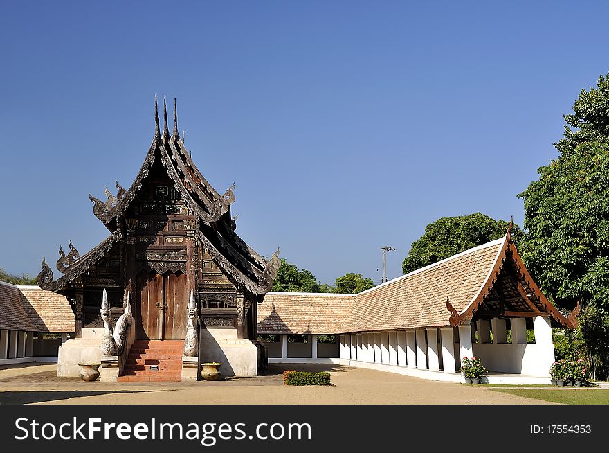 Old temple building. The wooden back Exquisite craftsmanship with the beautiful northern Thailand. Building a great value. History. Place in Chiang Mai, Thailand. Old temple building. The wooden back Exquisite craftsmanship with the beautiful northern Thailand. Building a great value. History. Place in Chiang Mai, Thailand.