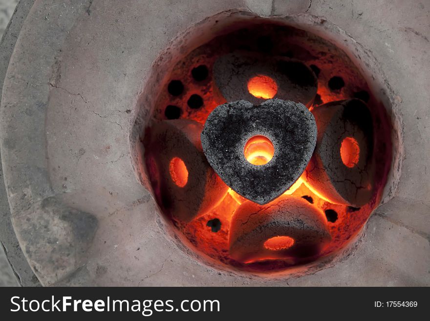 This is Heart being charcoal burned with flames. This is Heart being charcoal burned with flames.