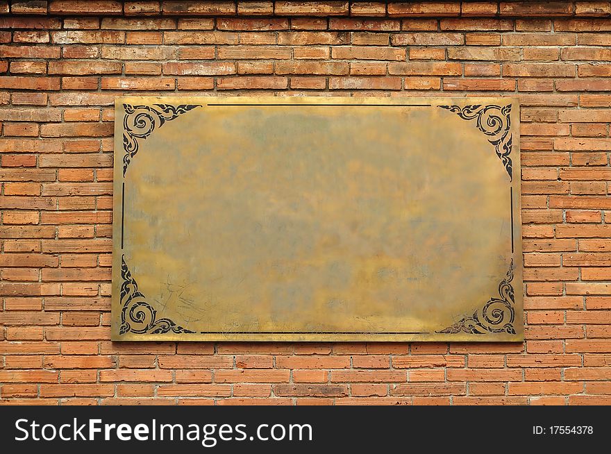 Frame Brass on brickwall background art outdoor