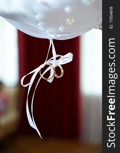 Wedding Gold Rings On White Ribbons