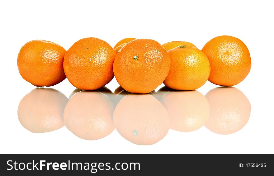 Group of mandarin fruit, isolated on white