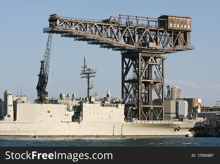 Old large hammerhead steel crane in navy yard, Garden Island, Sydney Australia. Old large hammerhead steel crane in navy yard, Garden Island, Sydney Australia.