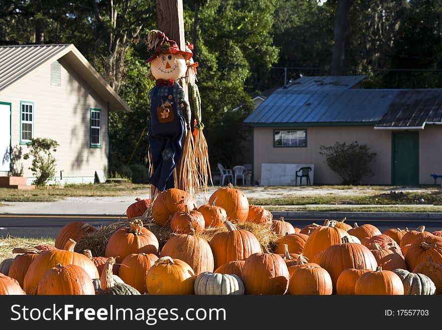 The halloween figure standing in straw