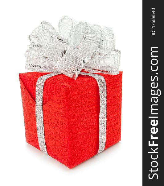 Red box with silver ribbon on white background. Red box with silver ribbon on white background