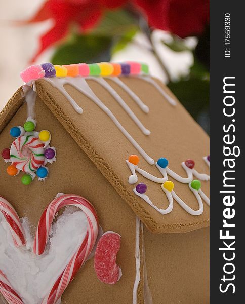 A gingerbread house all decorated with icing and candy.