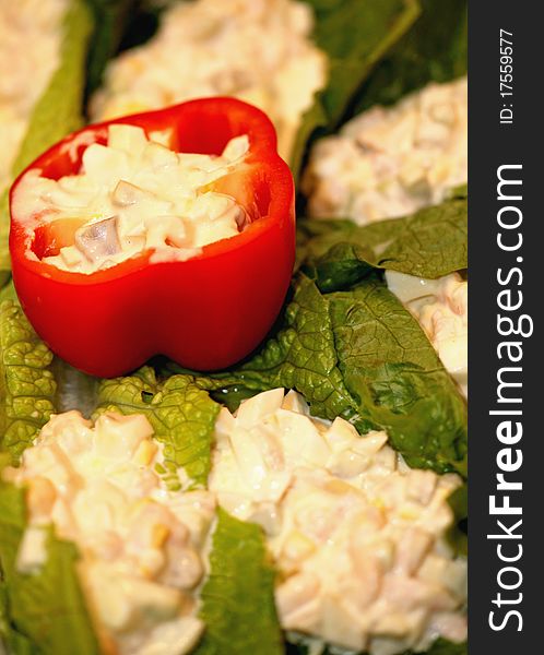 A green salad with pepper