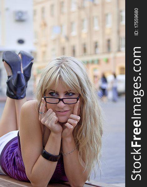 The charming young girl has carefree a rest in city centre