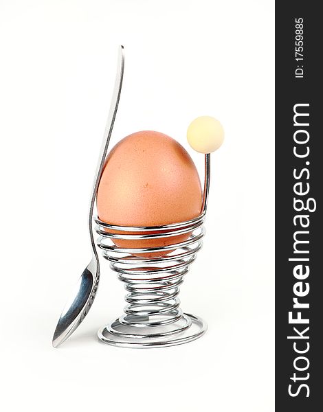 Boiled egg with spoon