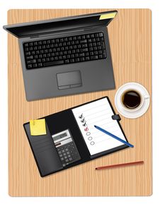 Laptop And Office Supplies Laying On The Board Royalty Free Stock Photos