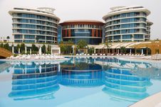 Luxury Hotel With Reflection In The Pool. Stock Photo Luxury Hotel With Reflection In The Pool. Stock Photo