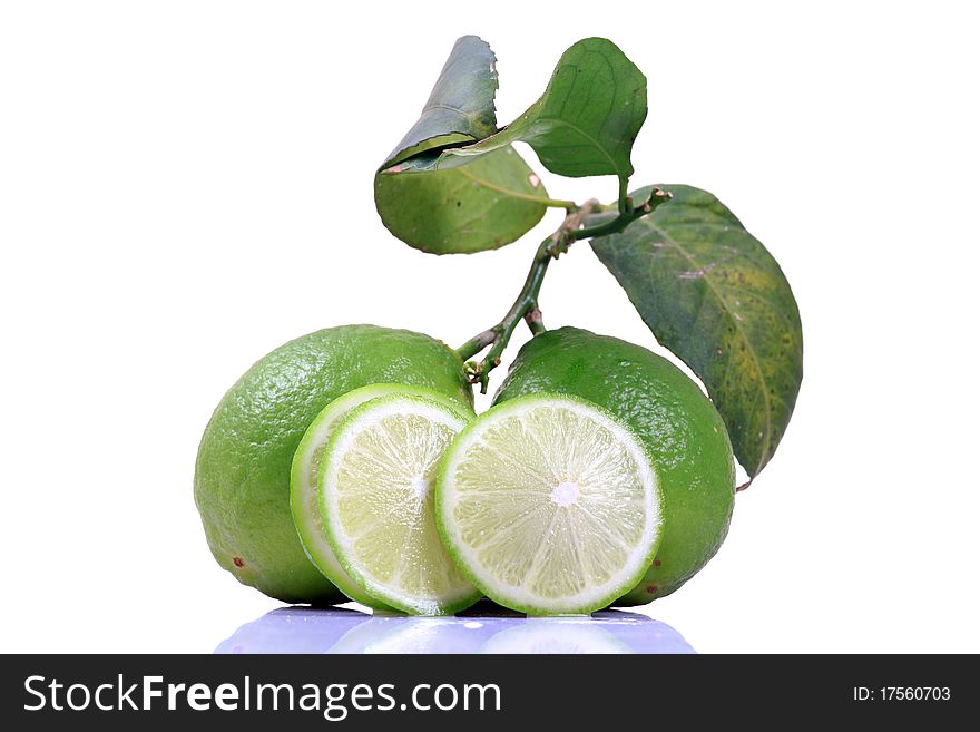 Bunch of fresh lime isolated on white background.